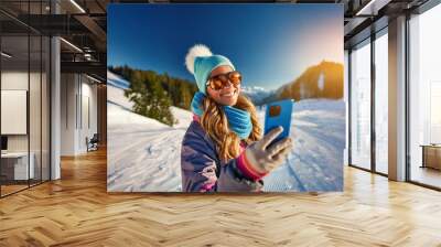 Happy beautiful woman taking a selfie hike
 Wall mural