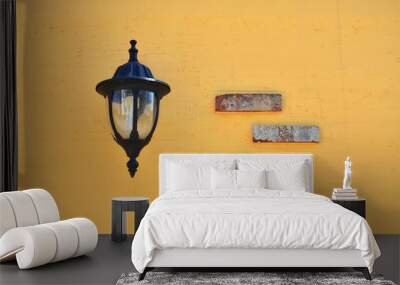 lamp on orange wall Wall mural