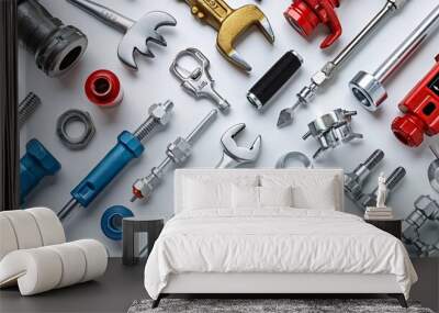 Top view of essential plumbing tools and components like pipe wrenches Teflon tape and various pipe fittings Stock Photo with copy space Wall mural