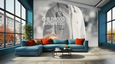 Doctor holding in hand Childhood Arthritis Wall mural