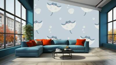 Seamless pattern with cute cartoon stingray character on a blue background. Childish sea animals design for fabric, textile, paper. Wall mural