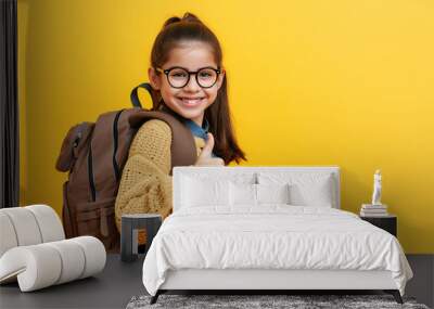 A happy schoolgirl with glasses gives two thumbs up, excited for class against a turquoise backdrop. Generative AI Wall mural