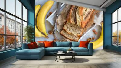 Fresh homemade banana bread with ingredients Wall mural