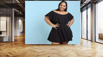 Plus size model in studio shoot happy smiling Wall mural