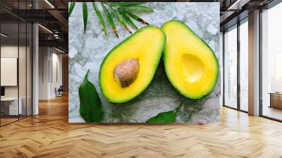 Fresh organic avocado isolated on white background.sliced avocado isolated.Tropical abstract background with avocado. Food concept. flat lay, top view.Fresh Organic Fruit for Healthy Lifestyle Concep. Wall mural