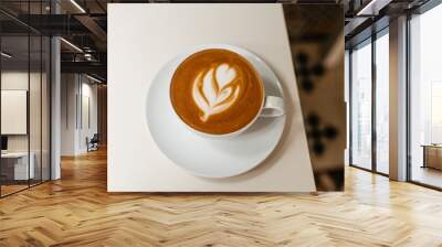 Delicious double cappuccino with beautiful foam in a white mug view from above. Wall mural