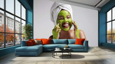 woman have fun with a face mask Wall mural