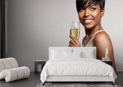 woman with a glass of champagne. Wall mural