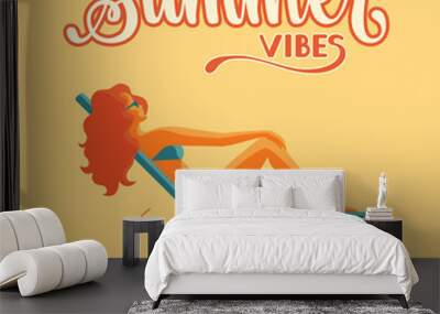 A long-haired girl in a swimsuit sunbathes in a deck chair Wall mural