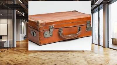 A vintage brown leather suitcase ready for travel adventures and exploration Wall mural