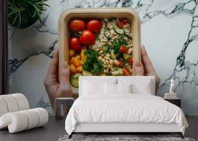 Display of a woman's hands presenting a healthy lunch box with fresh food for the workplace. Concept Nutritious Meals, Healthy Eating, Lunch Box Ideas, Fresh Ingredients, Workplace Wellness Wall mural