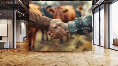 farmers shaking hands amidst an unfocused agricultural backdrop with cows diverse farmers of differe Wall mural