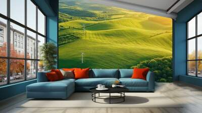 windmills in a green field, aerial view. copy space. green ecology landscape background Wall mural