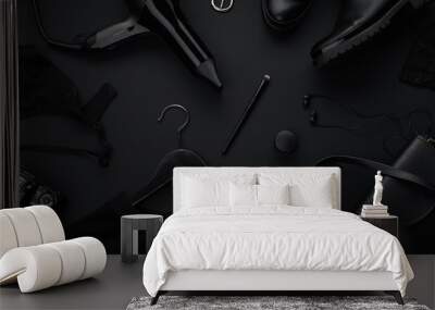 Black monochromatic flatlay on black background. Clothes, accessories and beauty equipment. Black friday sale concept Wall mural