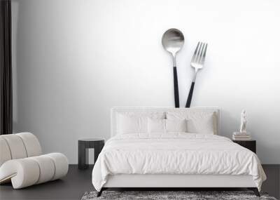 Flat lay cutlery on white background, fork and spoon isolated overhead Wall mural