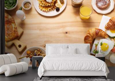 Overhead shot of brunch menu on wooden table with copy space.  Healthy sunday breakfast with croissants, waffles, granola and sandwiches. Flatlay with tasty food Wall mural