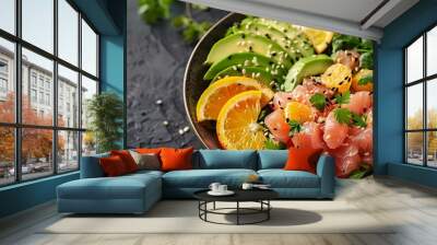 Overhead shot of Hawaiian tuna poke bowl garnished with orange slices and avocado. Concept Food Photography, Hawaiian Cuisine, Poke Bowl, Fresh Ingredients Wall mural