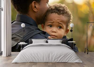 Police officer comforting a distressed child showcasing the positive relationship between law enforcement and the community. Concept Compassionate Community Policing, Comforting Moments Wall mural