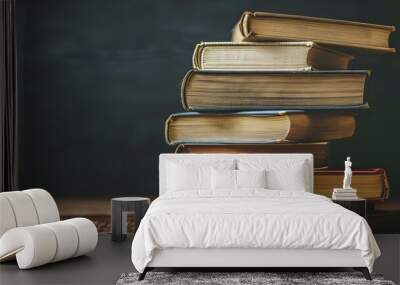 Stack of numerous books on a table. Concept education, reading, knowledge, intelligence, studying Wall mural