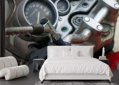 Steering wheel and dashboard of a red classic motorcycle Wall mural