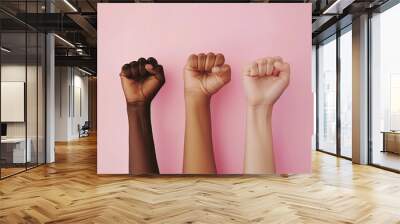 Fighting for women rights, Women hands making fist sign fighting for they rights on pink background Wall mural