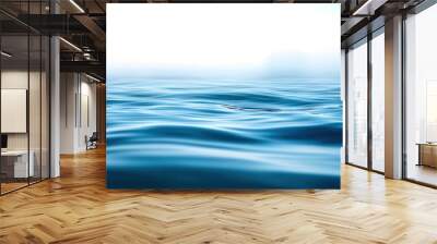 The image is of a calm body of water with a blue color Wall mural