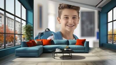 13-year-old boy wearing backpack smiling confidently. Portrait of a happy student with positive energy. Concept of childhood and education with a focus on growth and learning. Wall mural