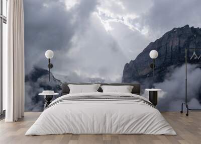 Hight Alps mountains and white clody sky with sunlight Wall mural