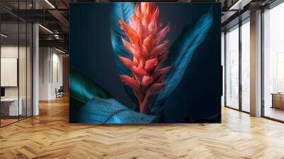 Red and blue tropical flower with dew drops against a dark background Wall mural