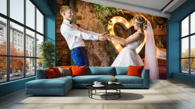 newlyweds in love at the wedding Wall mural