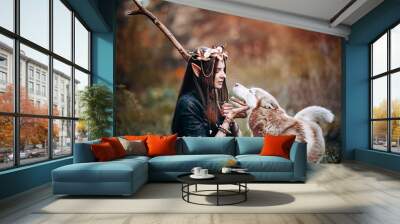 beautiful elf woman fabulous, fairy forest, famtasy young woman with long ears, long dark hair golden wreath crown on head with red dog like wolf Wall mural