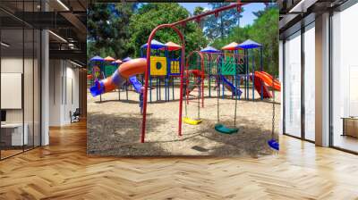 Children's playground in the park. Wall mural