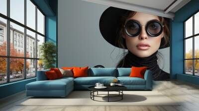 Beautiful girl model in a black hat close-up Wall mural