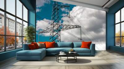 Power pylons and high-voltage lines against the background of the cloudy sky, power lines. Wall mural