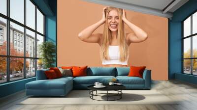 People, lifestyle, youth and teen age. Adorable happy 18 year old European girl with facial piercing and teeth braces looking with joyful broad smile, being in good mood, expressing positive emotions Wall mural