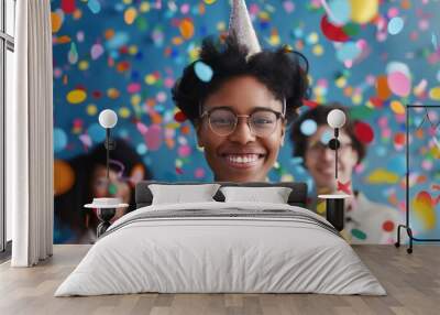 Young business woman having fun time catching confetti in the office. Party time on work place Wall mural