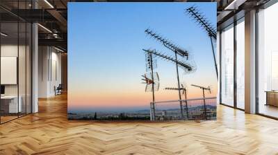 Antennas on the roof over the city. Athens, Greece Wall mural