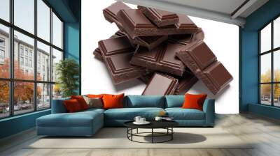 Dark organic chocolate pieces isolated on white background Wall mural