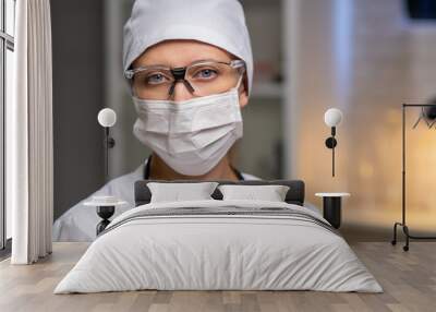 Female Doctor In Laboratory Office On Background Wall mural