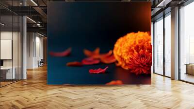 Arrangement featuring an ornate skull, marigold flowers, and glowing candles for a festive celebration. Wall mural