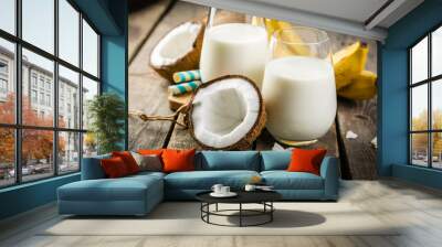 Coconut and banana smoothie and ingredients Wall mural