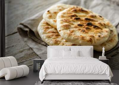 Traditional pita bread on rustic wood background, copy space Wall mural