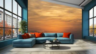 Sky background; Golden sky with cloud and sunlight in the afternoon Wall mural