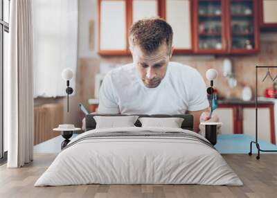 A man at home on a diet Wall mural