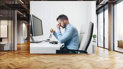 Tired businessman from heavy workload Wall mural