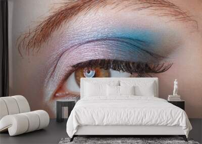 Woman with blue eye smokey beauty make up Wall mural