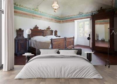 Wooden bedroom in ancient house with fresco Wall mural