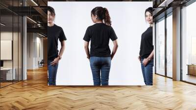 Front view black t-shirt Closeup on female body, woman girl in empty black t-shirt isolated on white background. Design woman t-shirt template and mockup for print. Wall mural