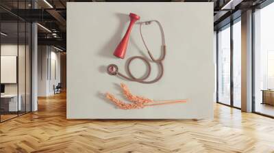 Stethoscope mockup. This tool serves to listen to sounds contained in the body. Such as lung sounds, heartbeat, and to check for disorders of the intestines and stomach. Wall mural