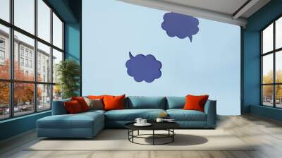 Three cloudy empty conversation box on bright blue background with letters splash on the ground with copy space. Compose your text message. Minimal chat or interview concept. A floating message view. Wall mural